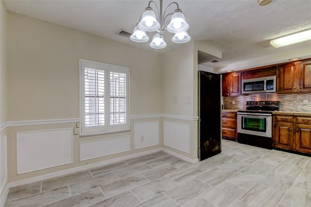 10406 RECLINATA LANE, Tampa, FL 33618