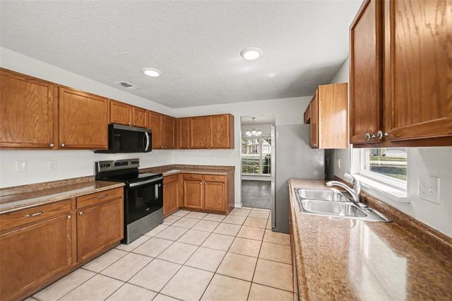 1461 E WHOOPING DRIVE, Groveland, FL 34736