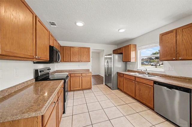 1461 E WHOOPING DRIVE, Groveland, FL 34736