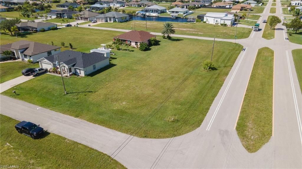 1054 NW 33rd PL, CAPE CORAL, FL 33993 — exterior
