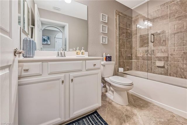 9572 Trevi CT 5037, Naples, FL 34113