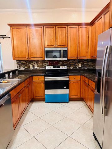 5200 Rising Comet Lane, Greenacres, FL 33463