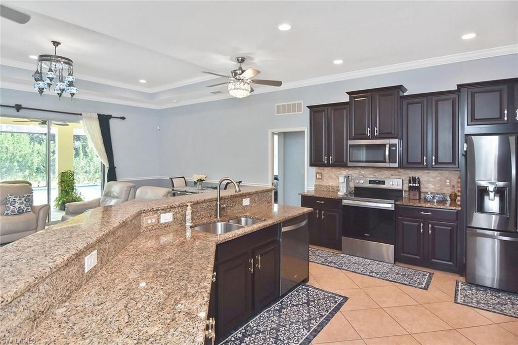2549 Ashbury CIR, CAPE CORAL, FL 33991 — photo 3