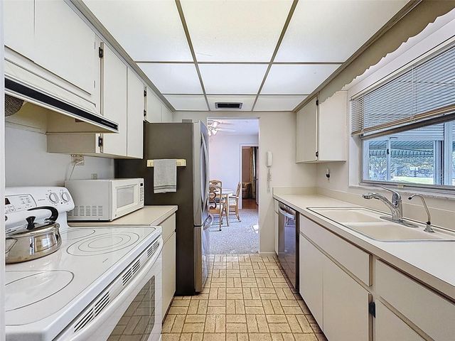 1446 QUEEN ANNE BOULEVARD, Palm Harbor, FL 34684