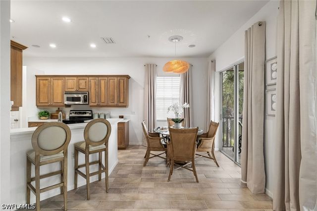 10100 Valiant CT 201, Miromar Lakes, FL 33913