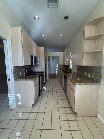 900 Bear Island Circle, West Palm Beach, FL 33409