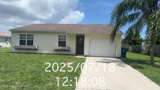 1015 Grandeur Street SE, Palm Bay, FL 32909