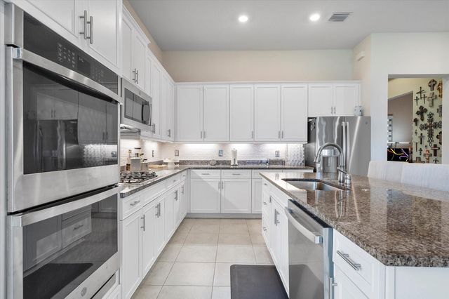 8318 W Blue Spring Drive, Parkland, FL 33067