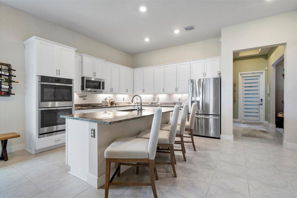 8318 W Blue Spring Drive, Parkland, FL 33067