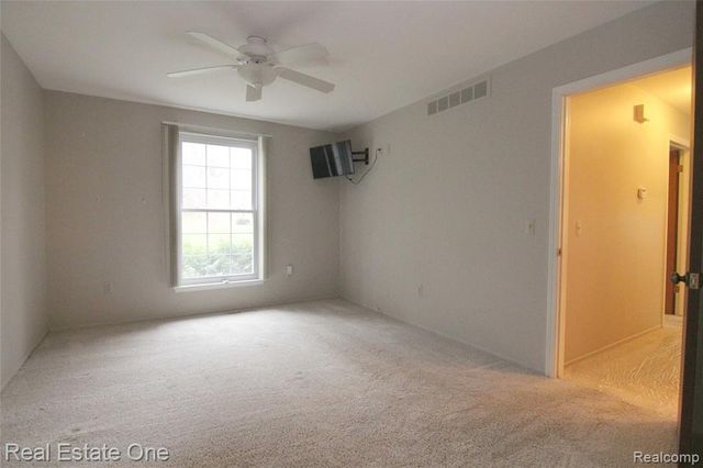 2110 Hidden Meadows Drive A, Walled Lake, MI 48390