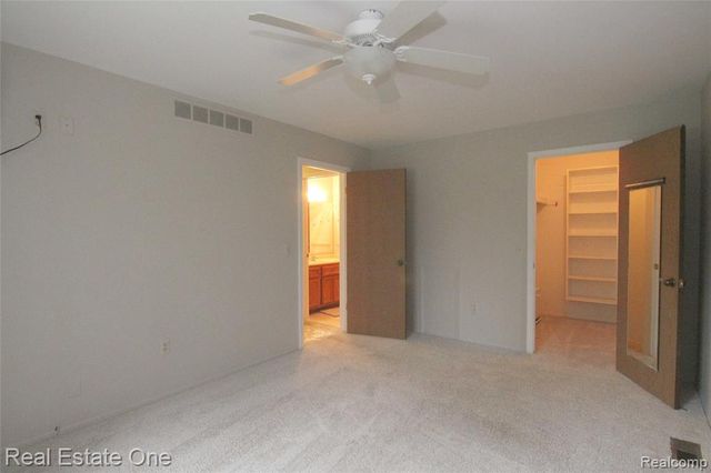 2110 Hidden Meadows Drive A, Walled Lake, MI 48390