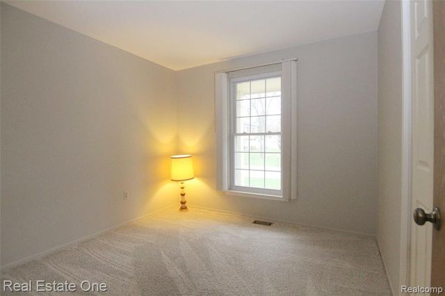 2110 Hidden Meadows Drive A, Walled Lake, MI 48390