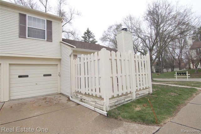 2110 Hidden Meadows Drive A, Walled Lake, MI 48390
