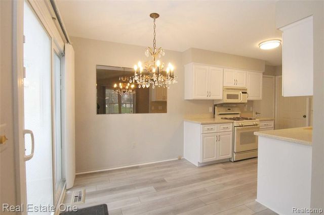 2110 Hidden Meadows Drive A, Walled Lake, MI 48390