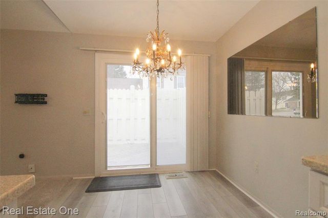 2110 Hidden Meadows Drive A, Walled Lake, MI 48390