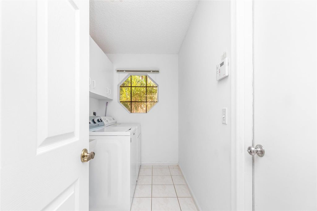 Image 28 of property listing at 6070 NW 96th Dr, Parkland, FL 33076