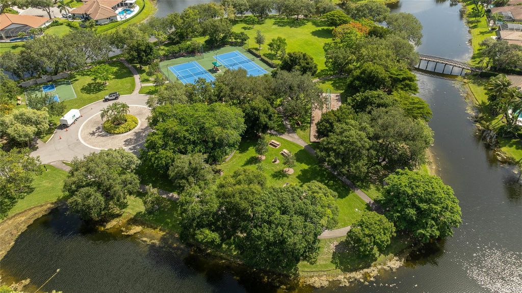 Image 54 of property listing at 6070 NW 96th Dr, Parkland, FL 33076