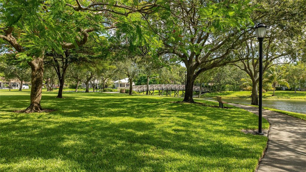 Image 56 of property listing at 6070 NW 96th Dr, Parkland, FL 33076