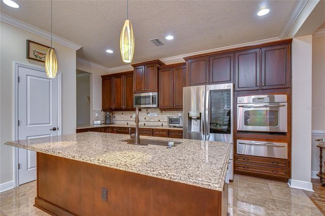 6806 MUNCASTER COURT, Tampa, FL 33625