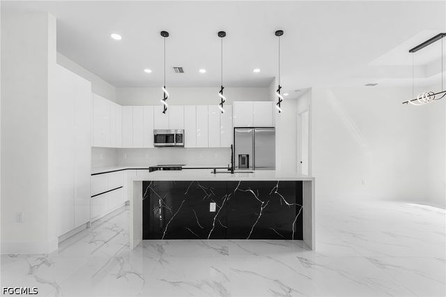 1321 Jackson AVE, Lehigh Acres, FL 33972