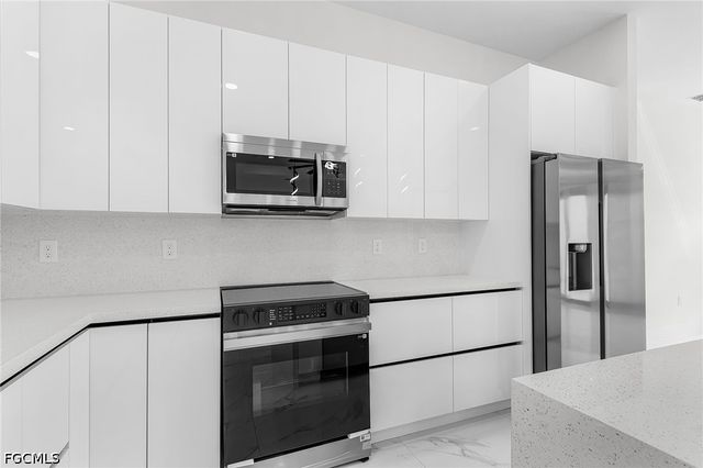 1321 Jackson AVE, Lehigh Acres, FL 33972