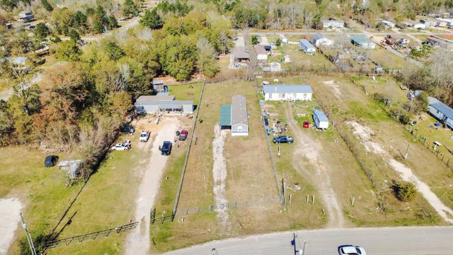 597 County Road 3406, Cleveland, TX 77327