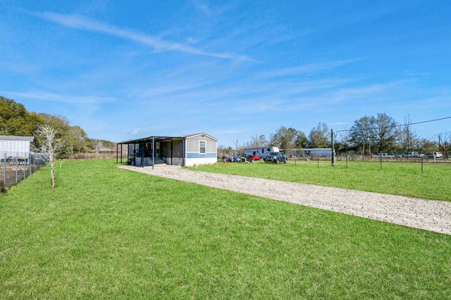 597 County Road 3406, Cleveland, TX 77327