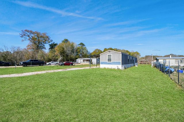 597 County Road 3406, Cleveland, TX 77327