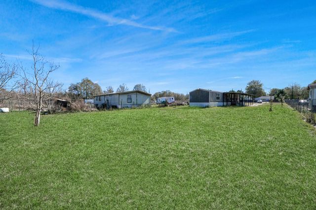 597 County Road 3406, Cleveland, TX 77327