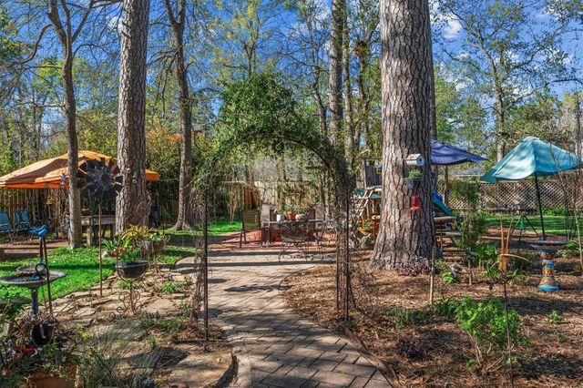 7406 Revelwood Drive, Magnolia, TX 77354