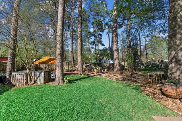 7406 Revelwood Drive, Magnolia, TX 77354