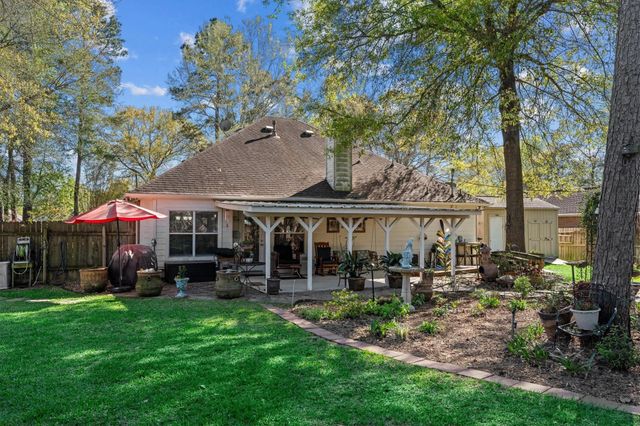 7406 Revelwood Drive, Magnolia, TX 77354