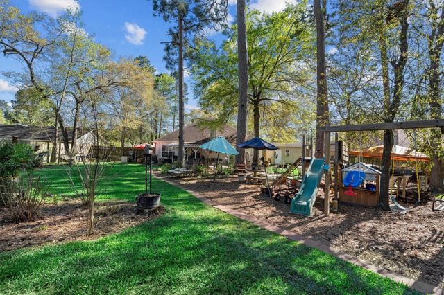 7406 Revelwood Drive, Magnolia, TX 77354