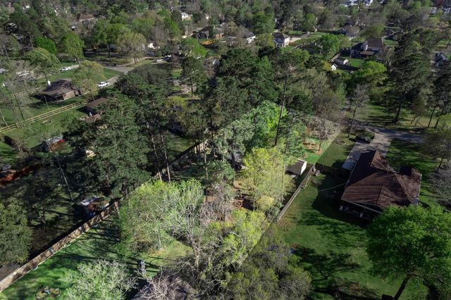 7406 Revelwood Drive, Magnolia, TX 77354