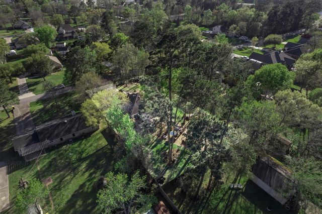 7406 Revelwood Drive, Magnolia, TX 77354