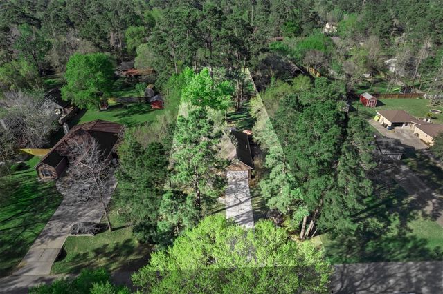 7406 Revelwood Drive, Magnolia, TX 77354