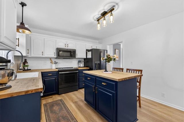 404 NW Orion Drive, Grain Valley, MO 64029