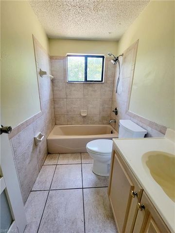704 W Cleveland LN, Lehigh Acres, FL 33936