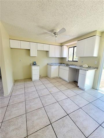 704 W Cleveland LN, Lehigh Acres, FL 33936