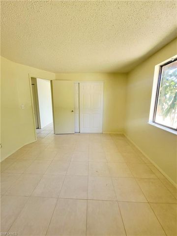 704 W Cleveland LN, Lehigh Acres, FL 33936
