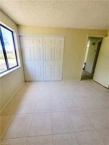 704 W Cleveland LN, Lehigh Acres, FL 33936