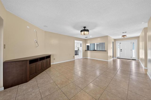 8877 BUTTERNUT BOULEVARD, Orlando, FL 32817