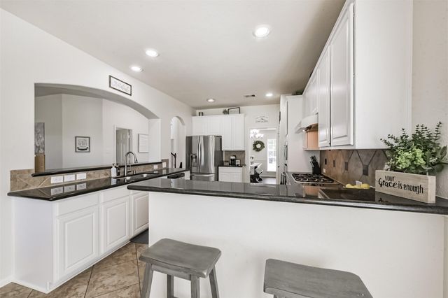 9719 Wincrest Drive, Mont Belvieu, TX 77523