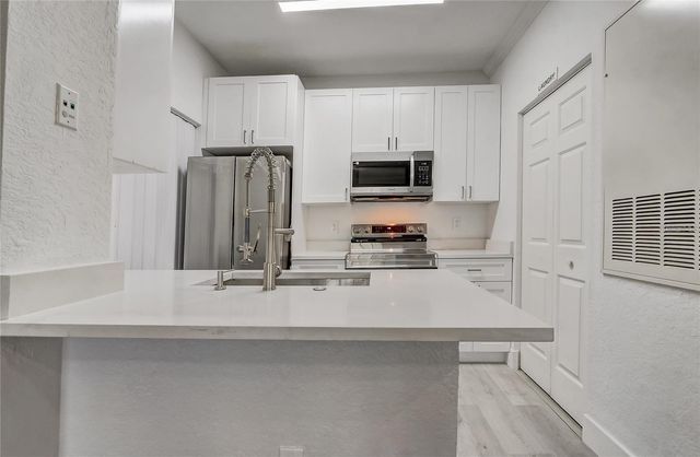 2674 ROBERT TRENT JONES DRIVE 322, Orlando, FL 32835
