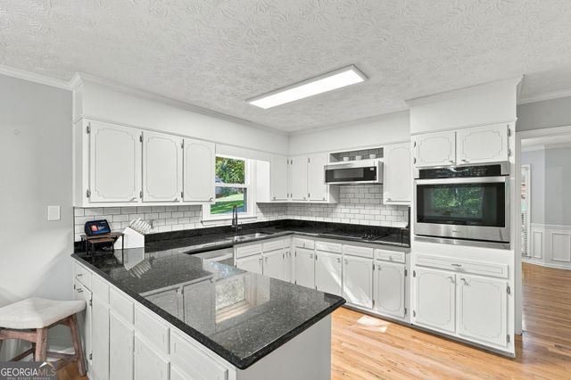 1544 Thoreau Drive, Suwanee, GA 30024
