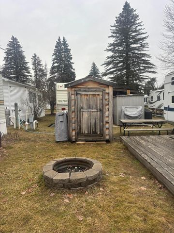 9806 Golf Port Drive N, Canadian Lakes, MI 49346