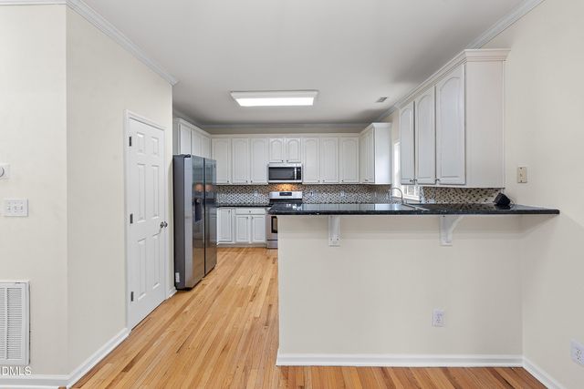1002 Chickering Court, Apex, NC 27502