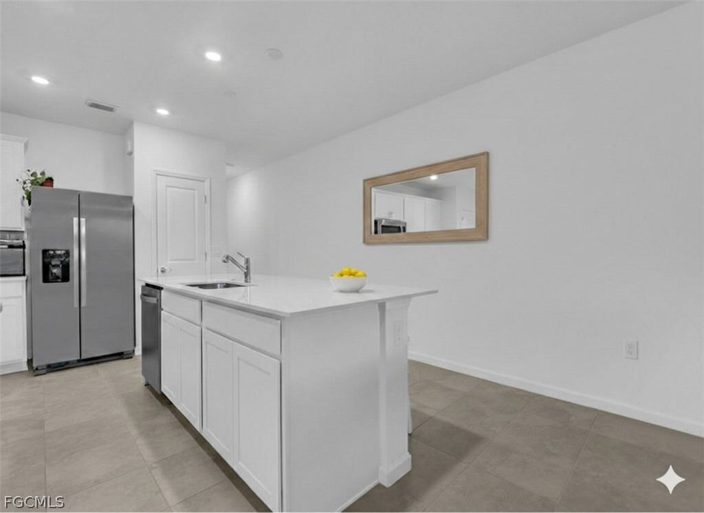 Image 5 of property listing at 1477 Weeping Willow CT, Cape Coral, FL 33909