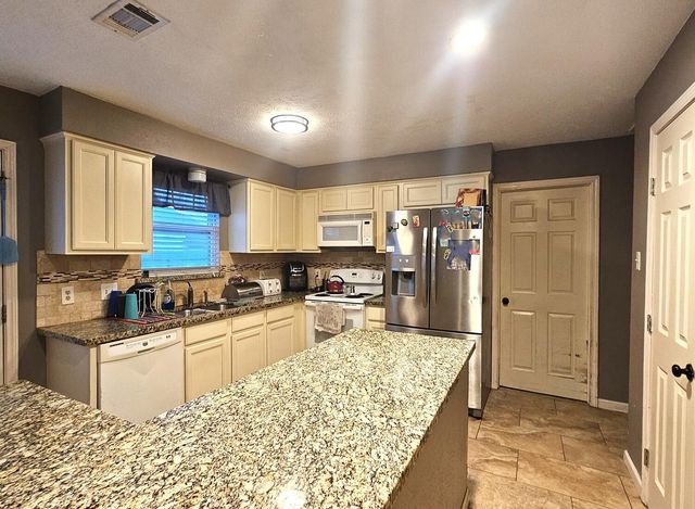 28914 Champion Oaks Drive, Magnolia, TX 77354