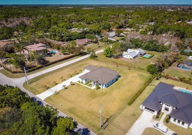 7595 155th Place N, Palm Beach Gardens, FL 33418